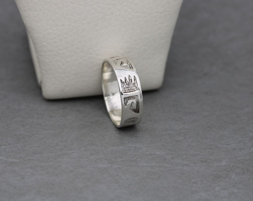 Sterling silver ring band with an etched pattern