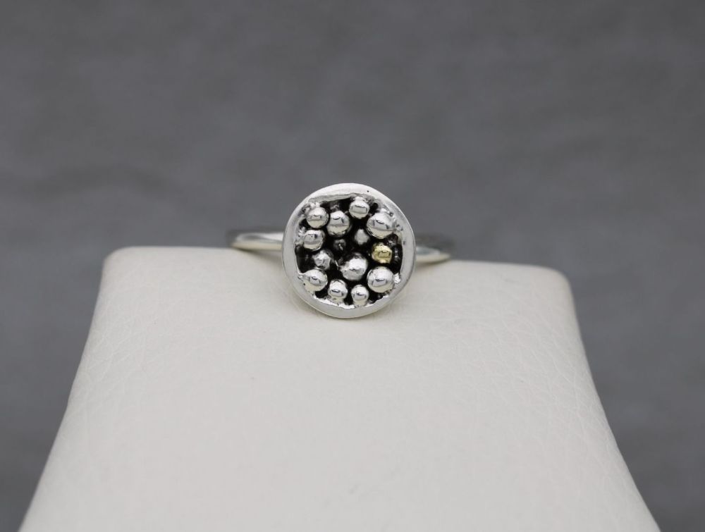 Handmade sterling silver ring with silver & gold granulation