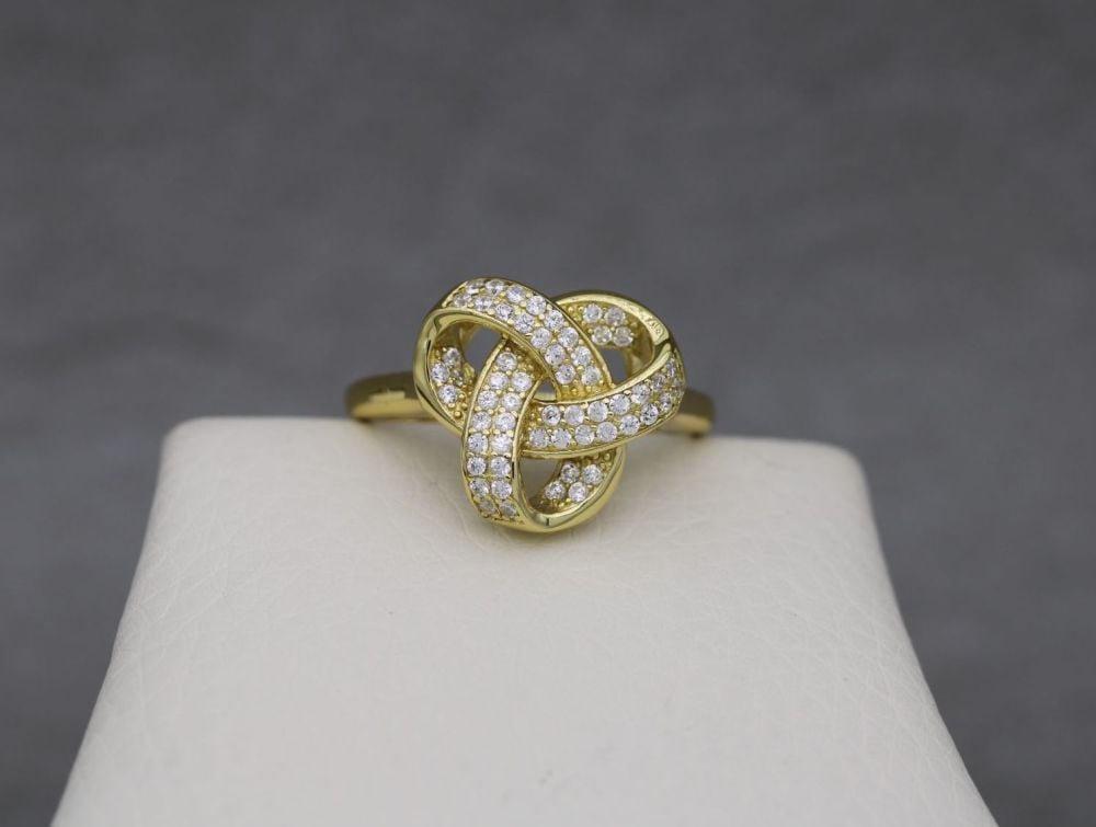 Gold plated sterling silver knot ring with tiny clear stones