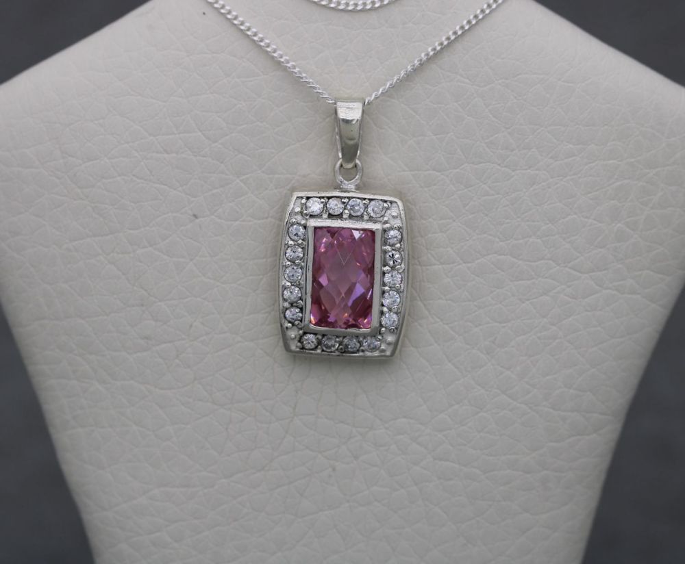 Small rectangular sterling silver necklace with pink & clear stones