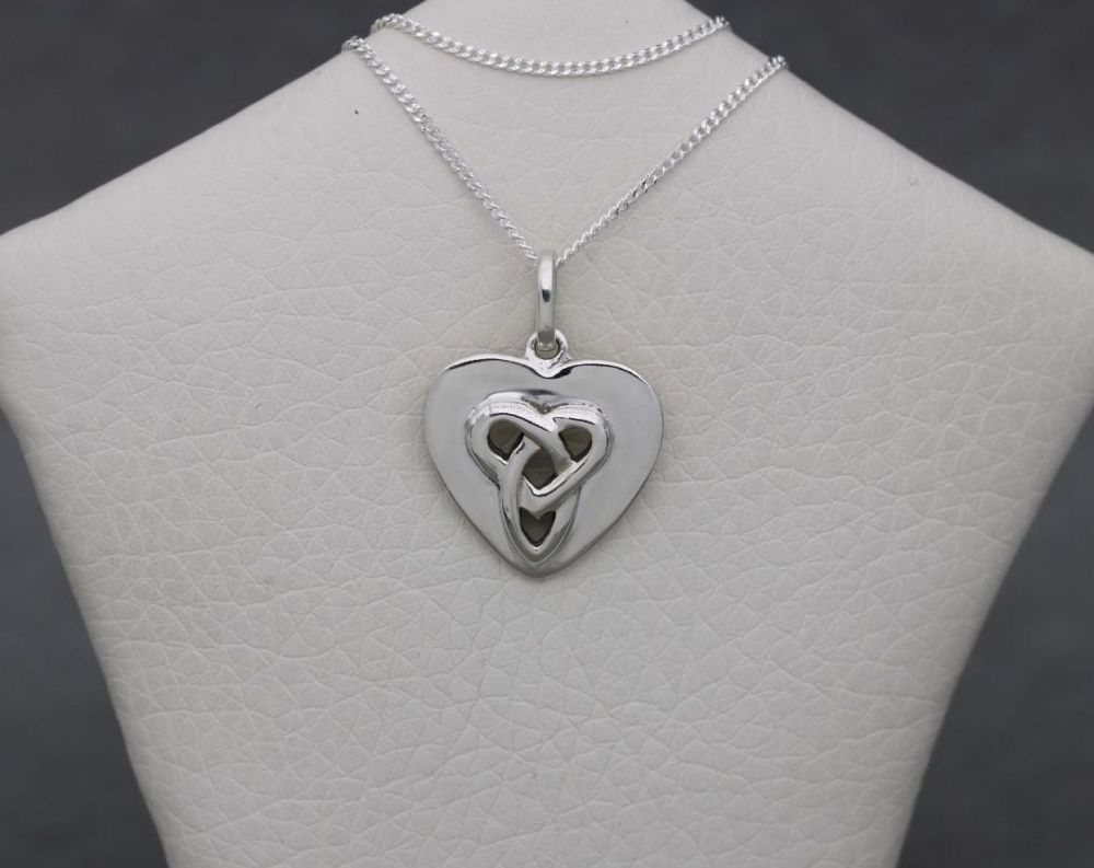 Small sterling silver heart necklace with a celtic knot design