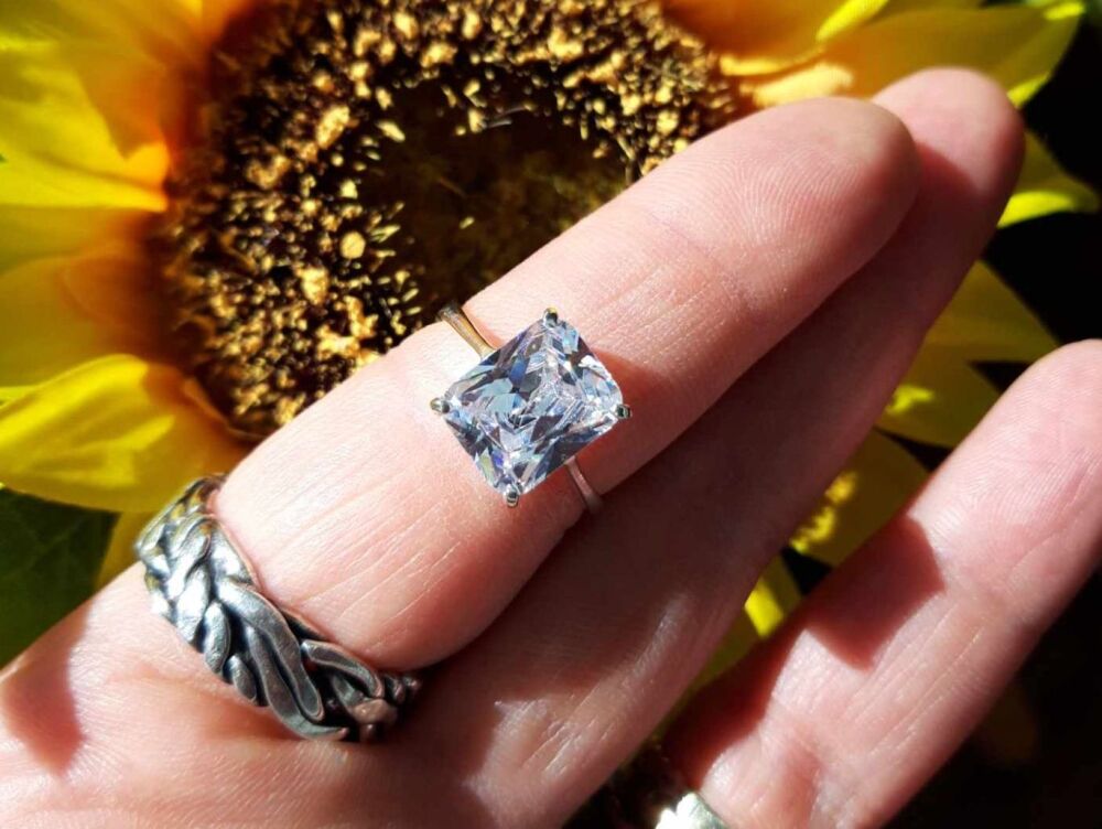 REFURBISHED Sterling silver & clear rectangular stone solitaire ring (O ½)