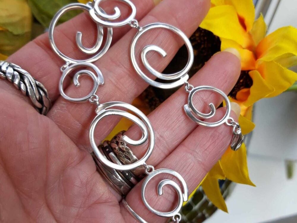 REFURBISHED Sterling silver swirls bracelet