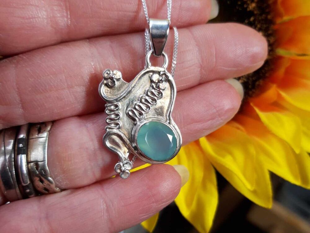 REFURBISHED Sterling silver butterfly necklace with a watery blue-green stone