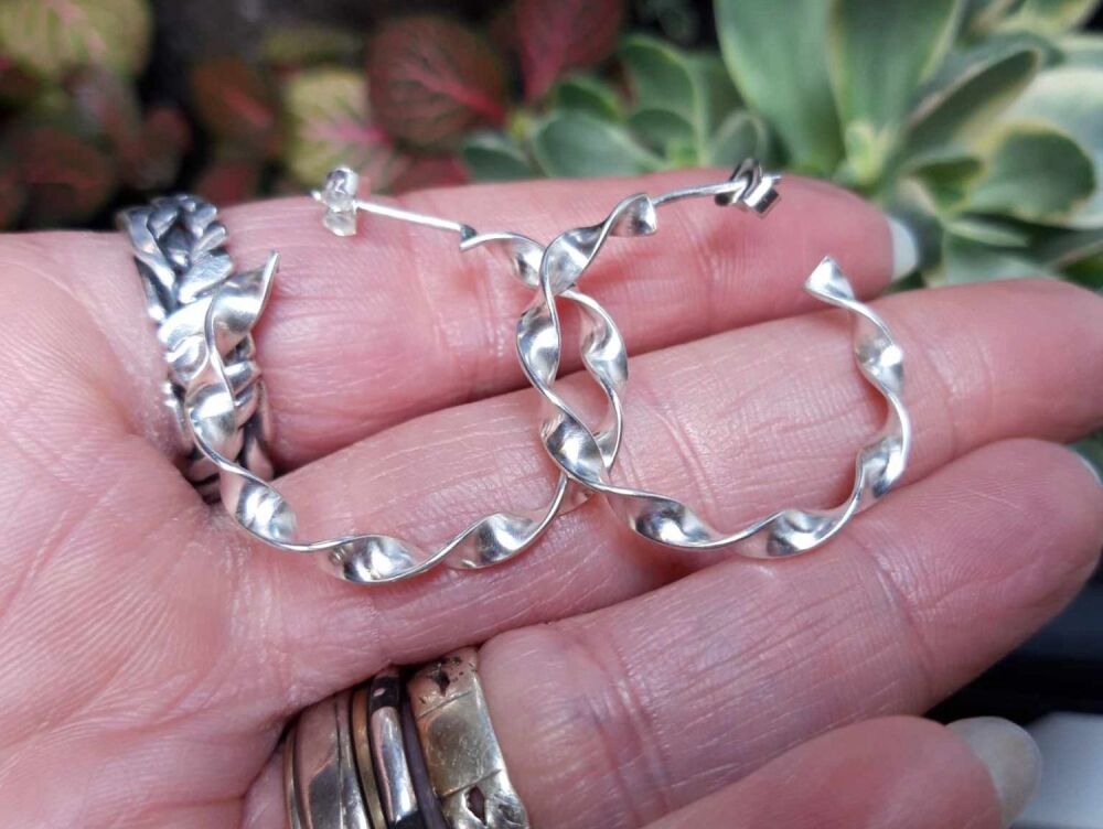 REFURBISHED Twisted sterling silver hoop style earrings