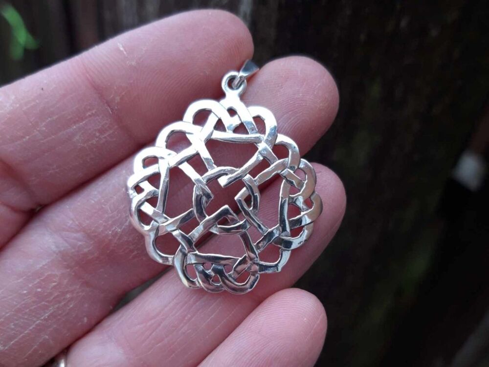 REFURBISHED Sterling silver celtic knot pendant featuring infinity hearts