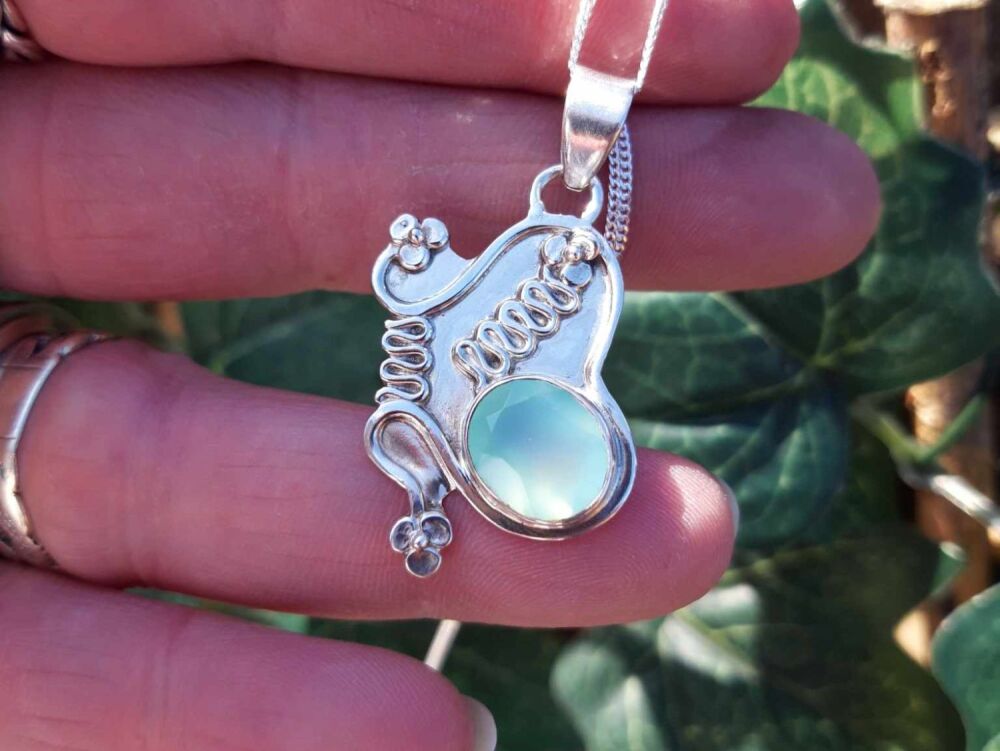 REFURBISHED Sterling silver butterfly necklace with a watery blue-green stone