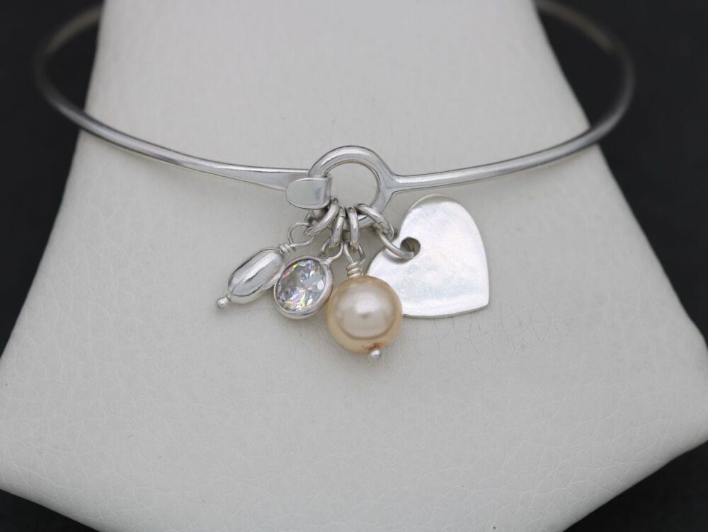 REFURBISHED Sterling silver bangle with charms