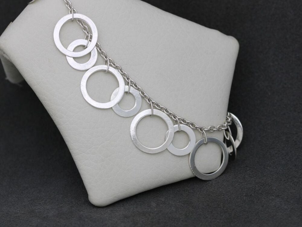 REFURBISHED Sterling silver open discs bracelet
