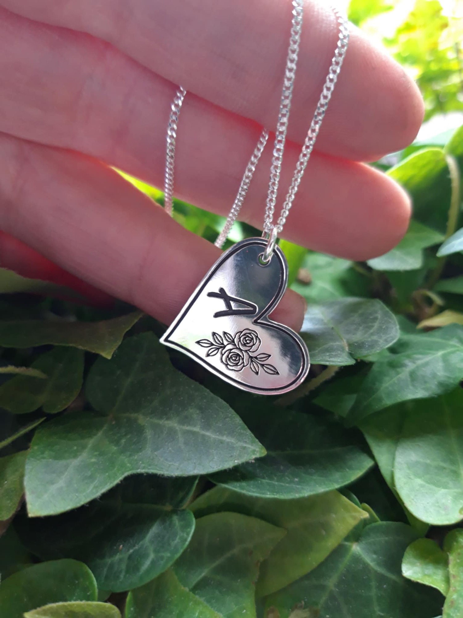 finished letter A in hand by window (1)