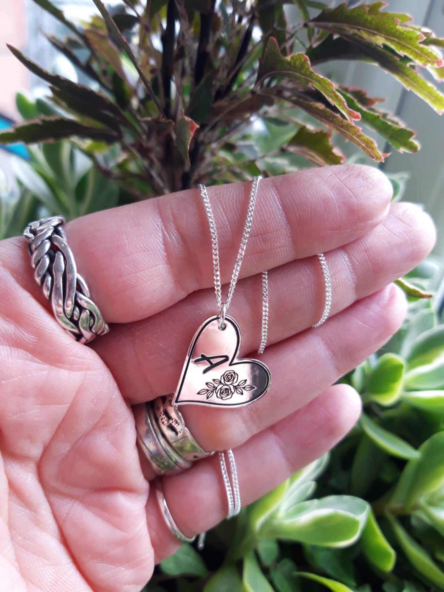 finished letter A in hand by window (5)