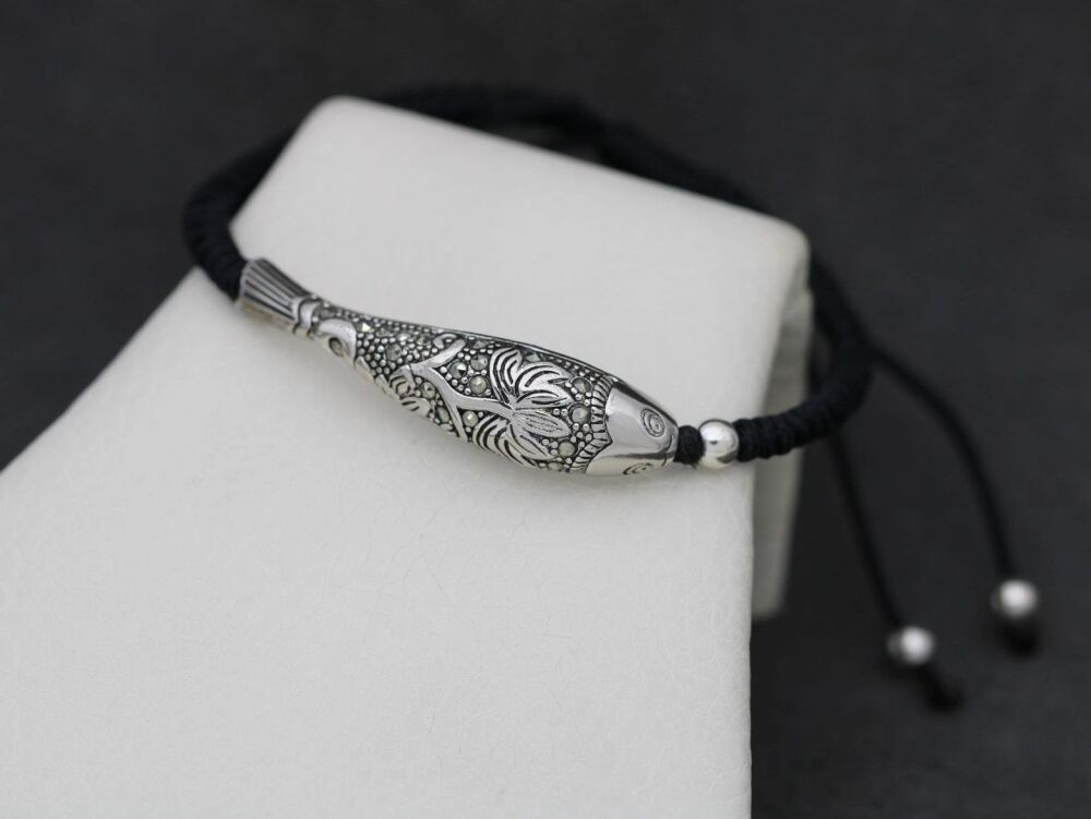 REFURBISHED Sterling silver, marcasite & black cord 'lucky fish' bracelet
