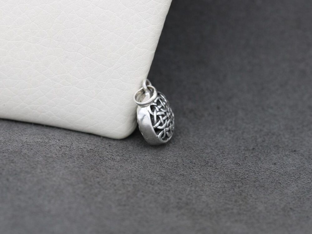 REFURBISHED Sterling silver double sided celtic bead pendant
