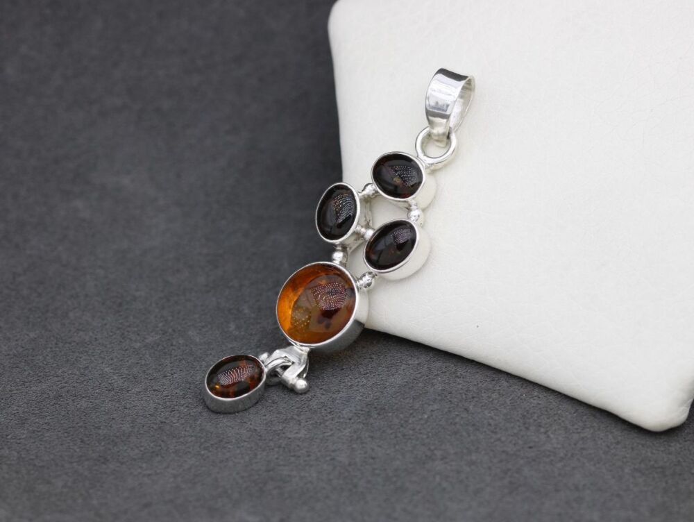 REFURBISHED Articulated sterling silver & multi amber pendant