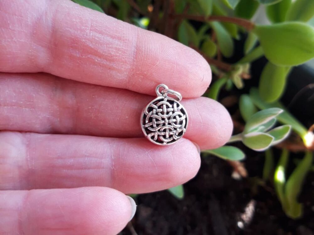 REFURBISHED Sterling silver double sided celtic bead pendant