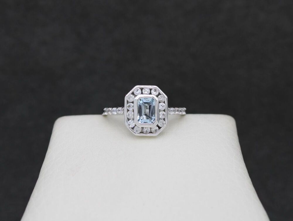 REFURBISHED Sterling silver halo ring with pale blue & clear stones (L ½)