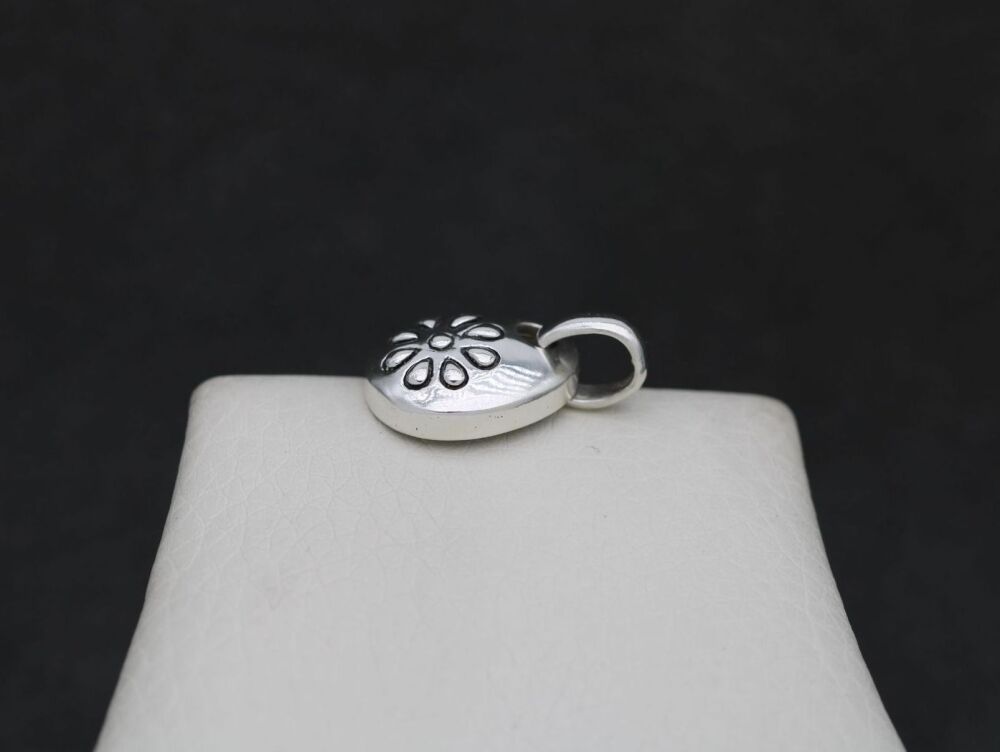 REFURBISHED Unusual domed sterling silver pendant with a floral design