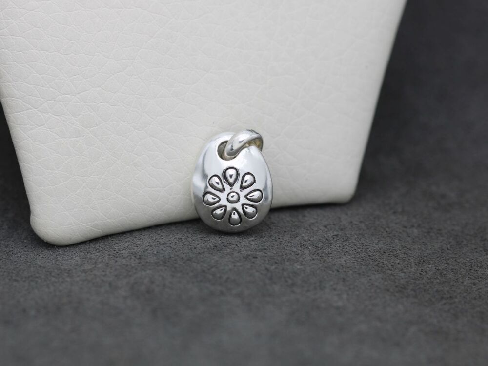REFURBISHED Unusual domed sterling silver pendant with a floral design