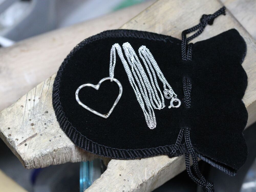 HANDMADE Hammered sterling silver heart pendant