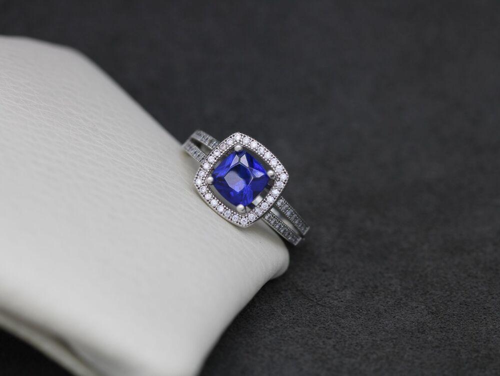 REFURBISHED Sterling silver halo ring with deep blue and clear stones (N)