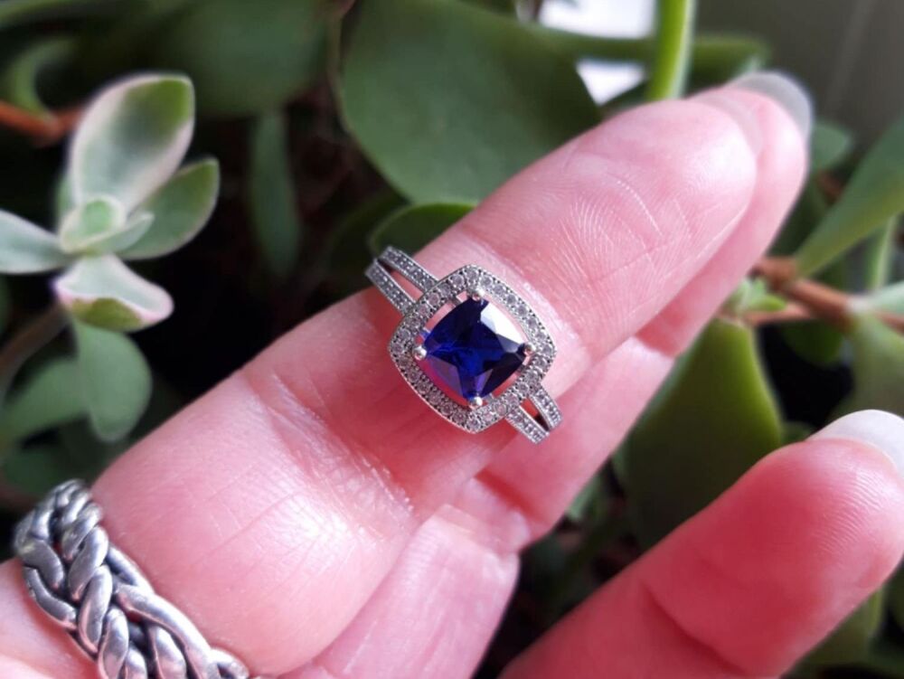 REFURBISHED Sterling silver halo ring with deep blue and clear stones (N)