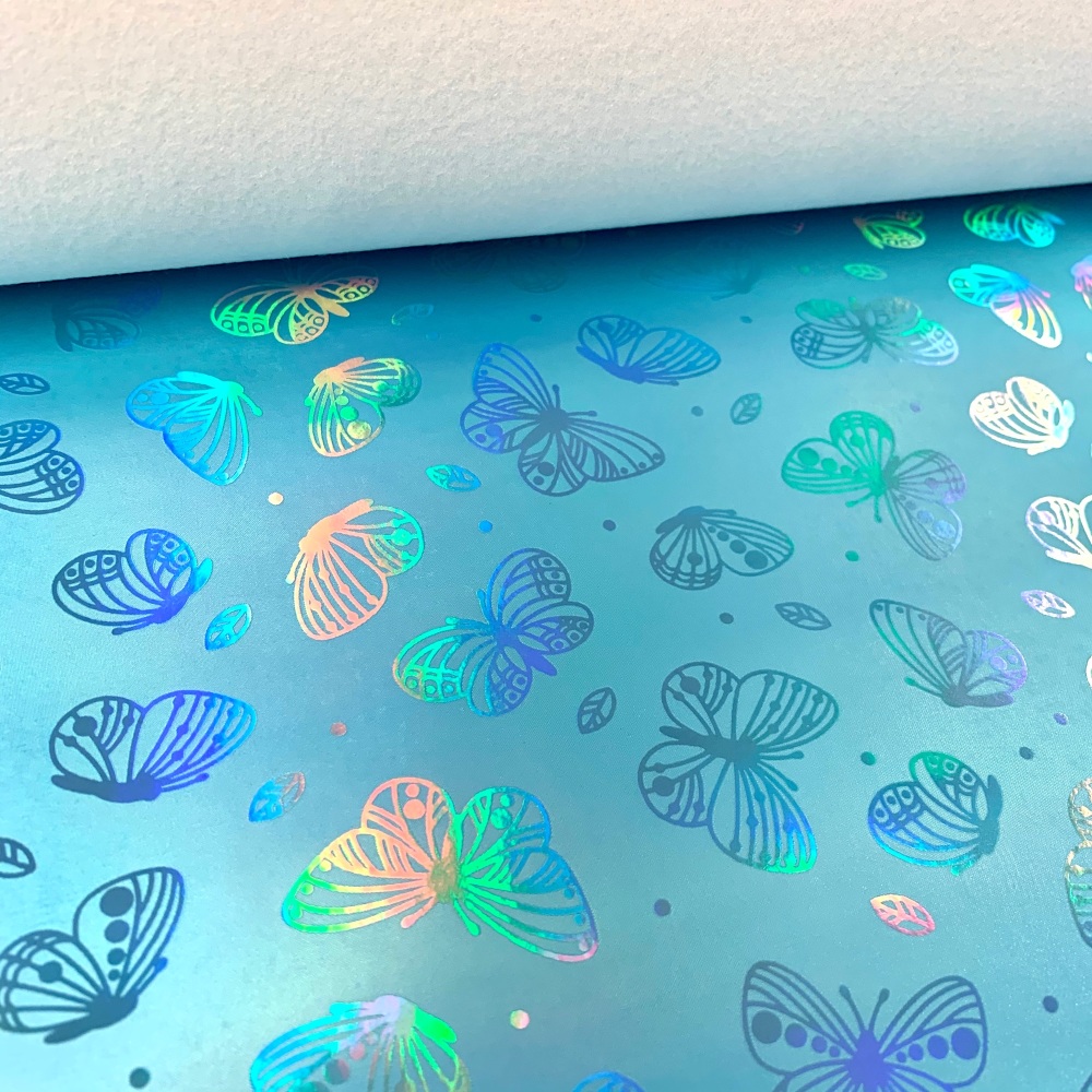 Turquoise Holographic butterfly vinyl fabric sold in sizes a4 , A3 and Roll