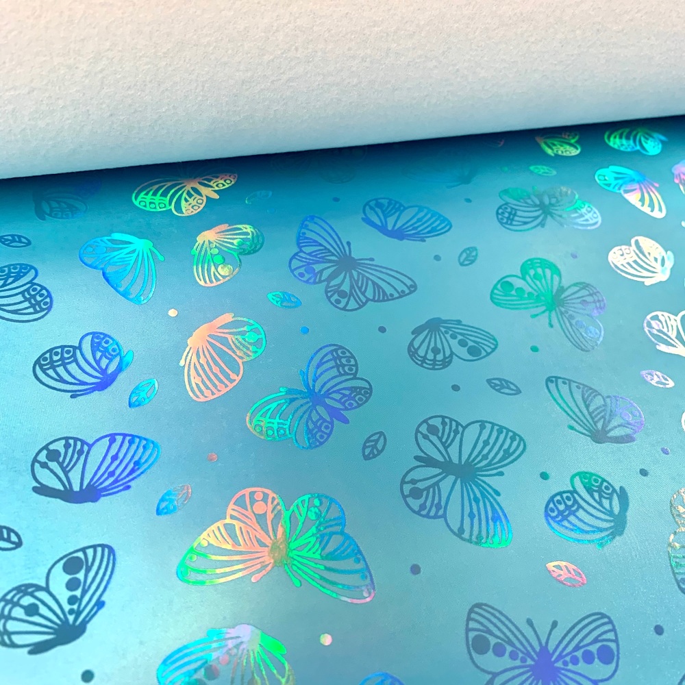 Turquoise Holographic butterfly vinyl fabric sold in sizes a4 , A3 and Rol