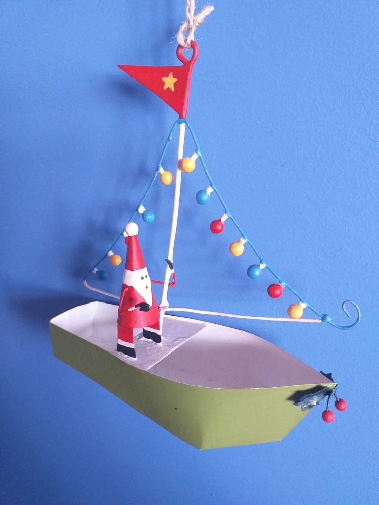 Metal Santa in Boat with Lights