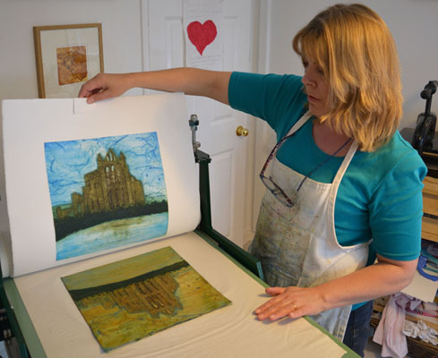 Jane Duke pulling a print