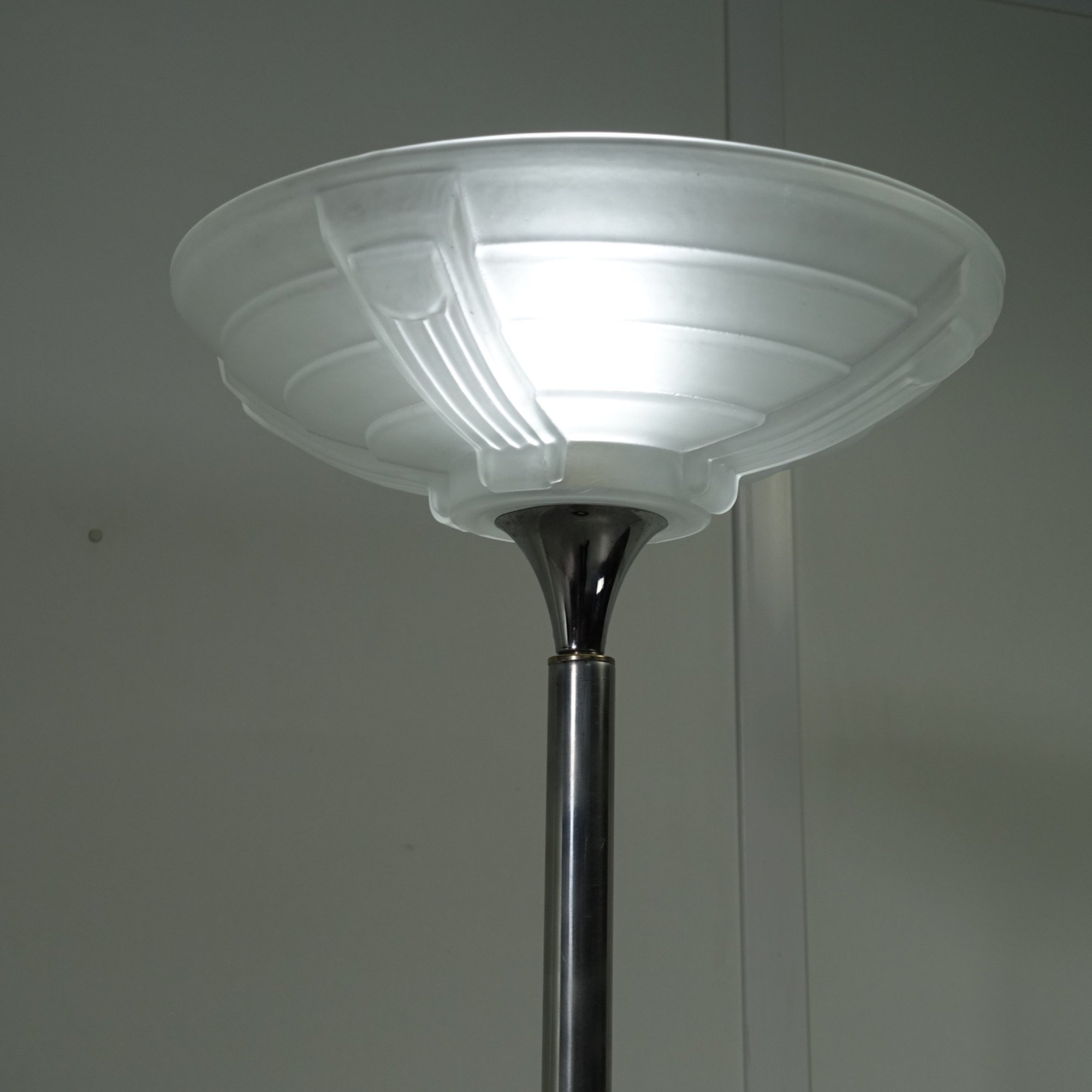 `Floor lamp with glass rods.