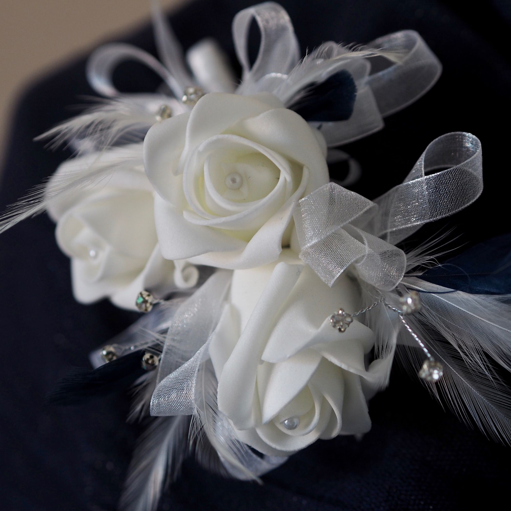 Bespoke white foam wedidng corsage