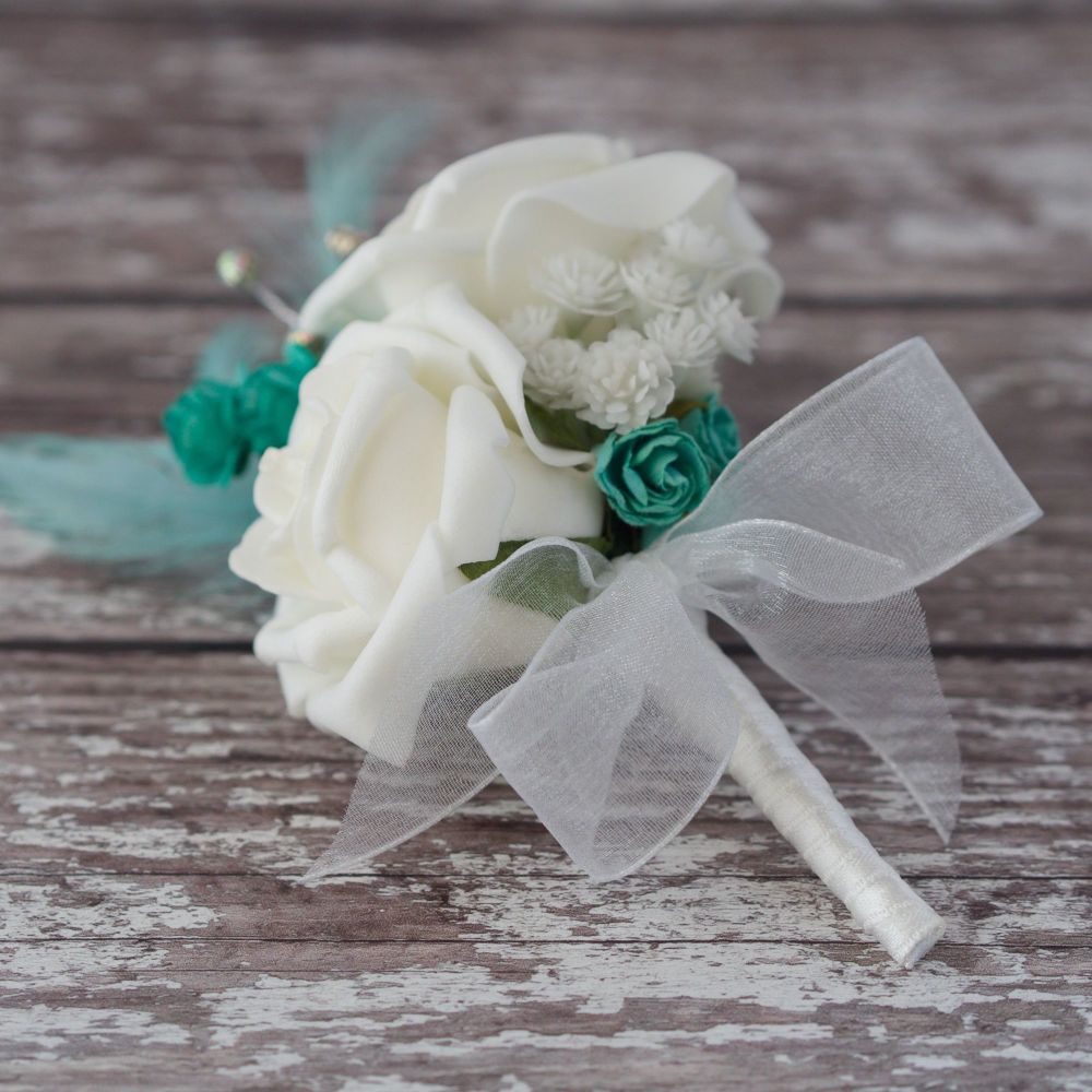 <!--095-->White Foam Roses Turquoise Feathers Silver diamante wedding Corsa