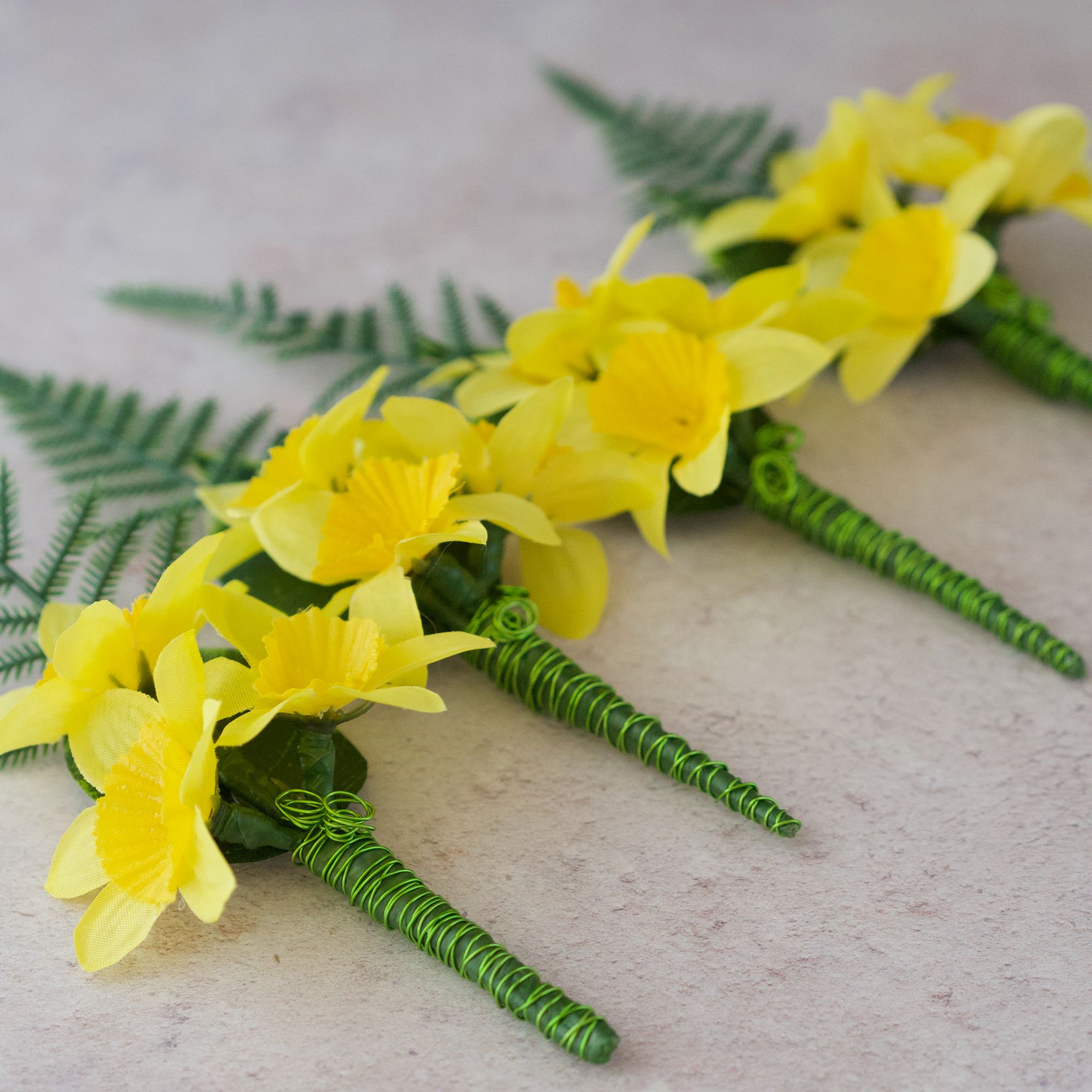 Artificial daffodil wedding buttonhole