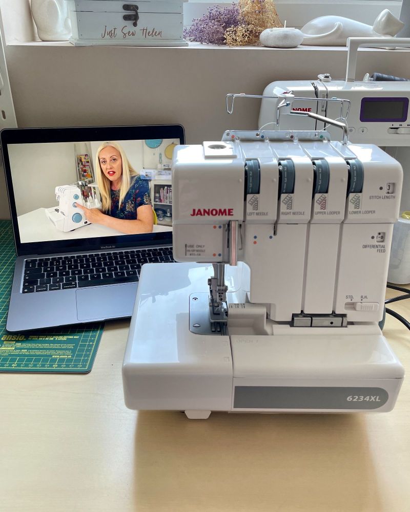 Overlocker course Stitch Sisters showing on laptop behind an overlocker machine.