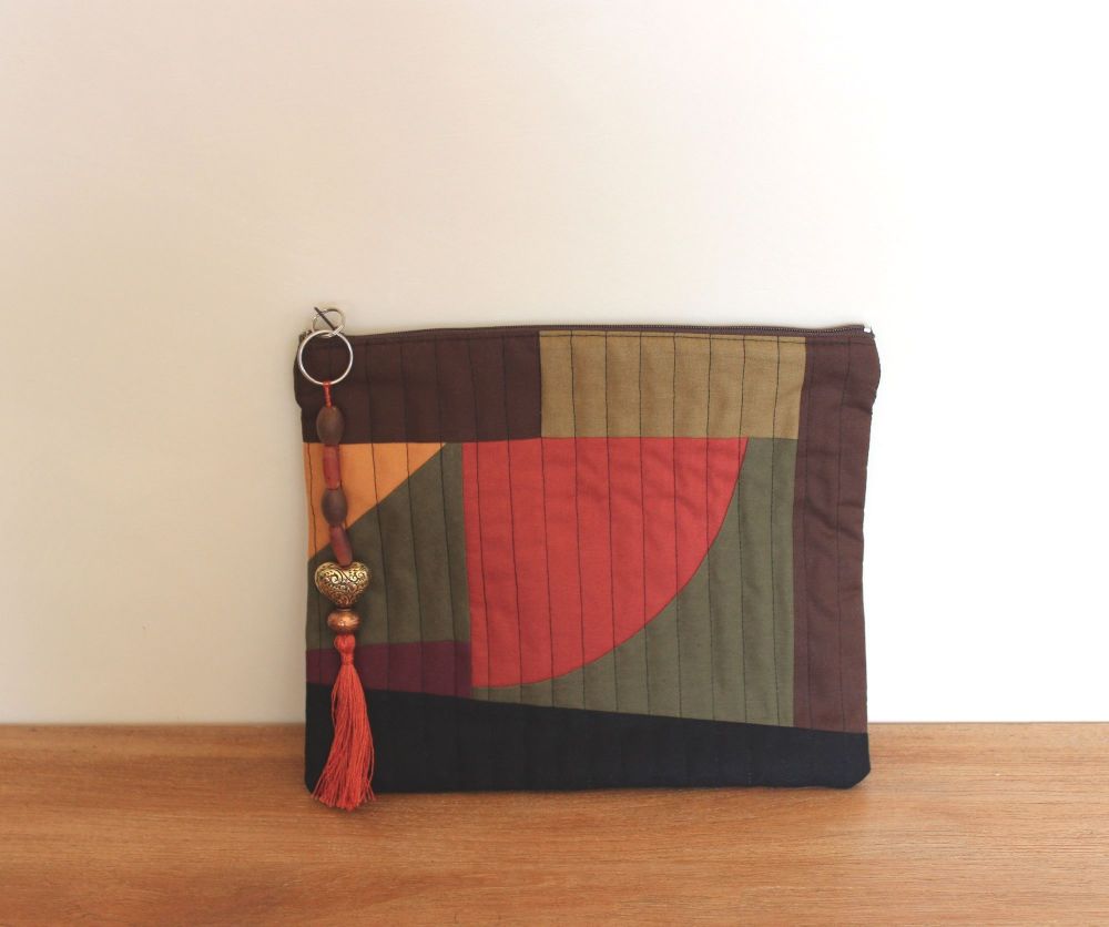 A Dorset Patchworks Bits and Bobs Quilted Pouch (Dark Hues - Curved)