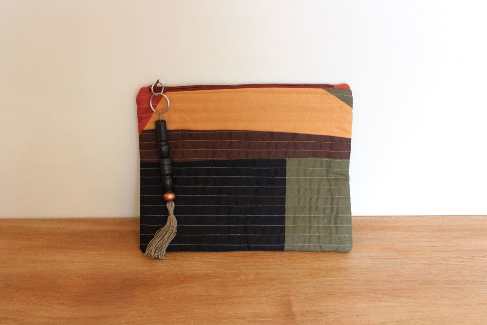 A Dorset Patchworks Bits and Bobs Quilted Pouch (Dark Hues)