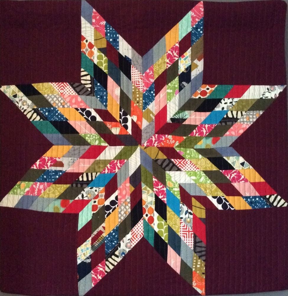 Scrappy Lone Star Quilted Wall Hanging