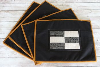Set of Four Black and Natural Wayside Quilted Place Mats