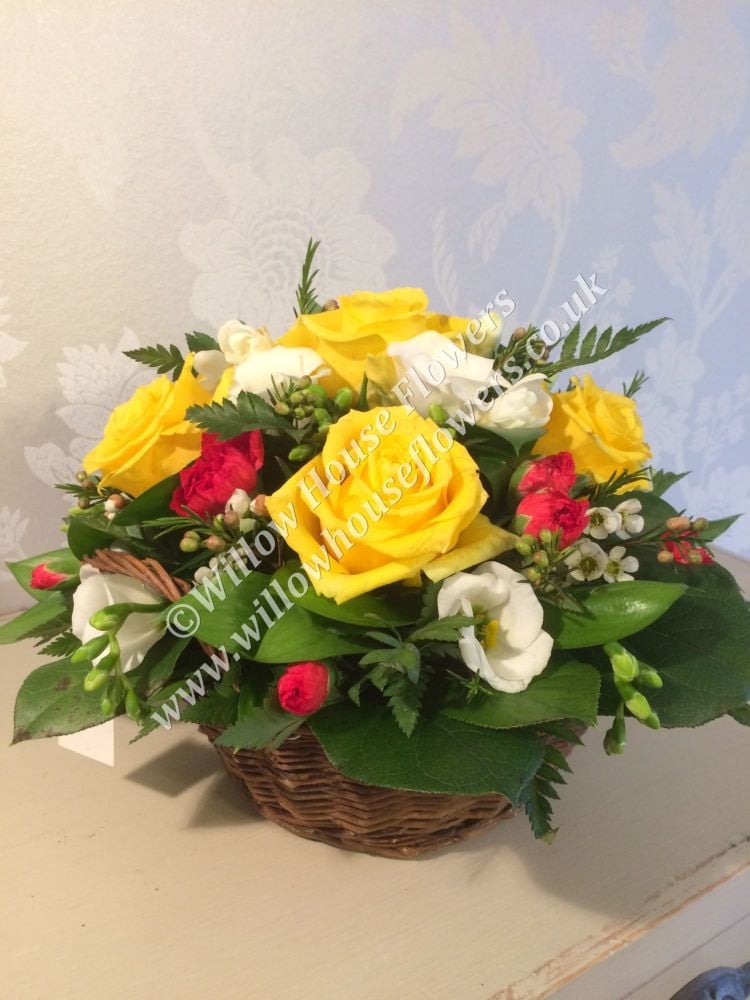Round Basket fresh seasonal flower arrangement - various Rose colours or a 