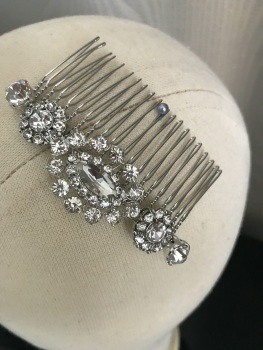 Silver crystal hair comb.