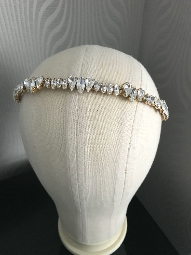 Set of two gold headbands.