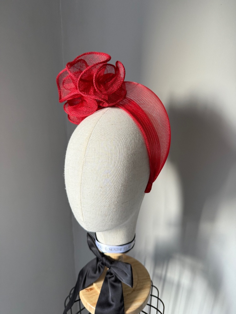 Red ruffle fascinator