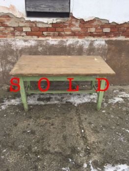 Woodn table with green legs