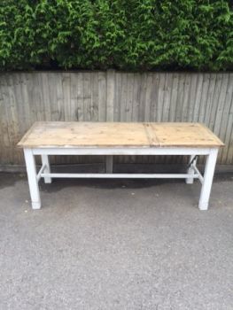 wooden table with white legs