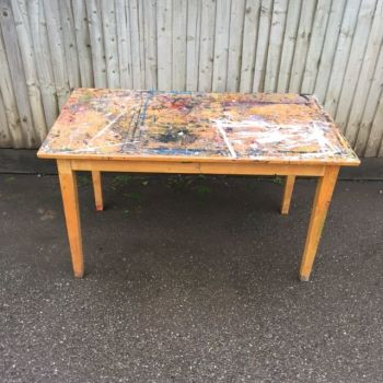 Paint splattered pine table 