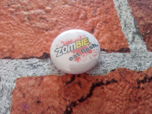 Zombie. Eat Flesh. 25mm/1 inch pin badge