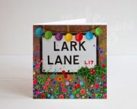 Jo Gough - A Festive Lark Lane St Sign with flowers Christmas Card
