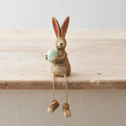 Sitting Rabbit with dangly legs and green egg