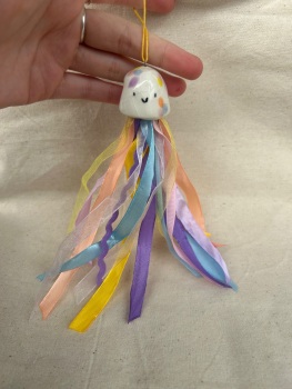 White purple , blue and or orange /blue/pink jellyfish