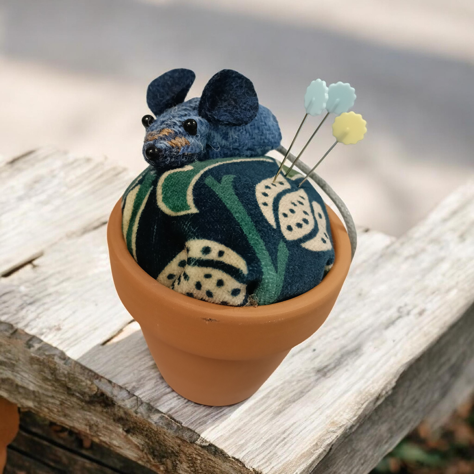 CDC Pin Cushion with Mouse.png